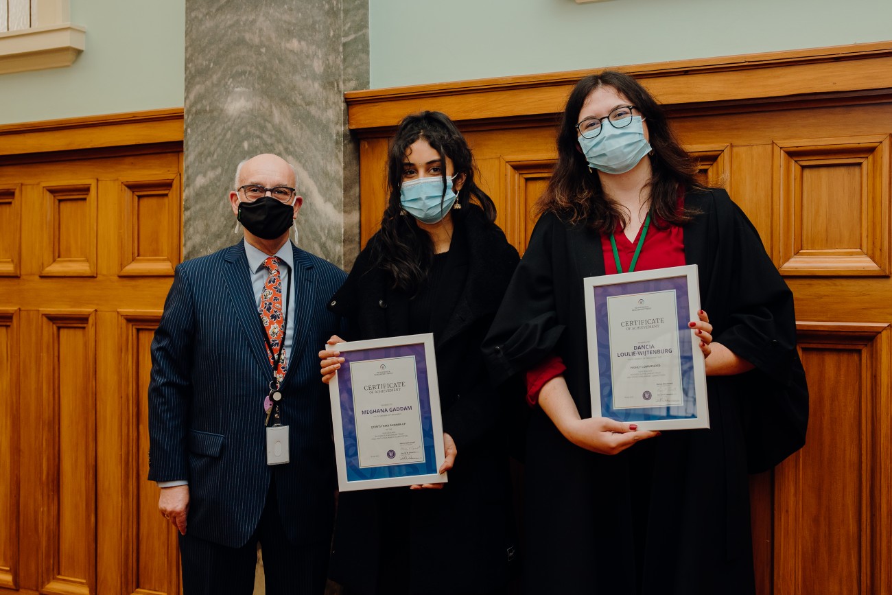 Darryl Stevens standing next to the two competition winners of Youth Parliament 2022, Meghana and Danica